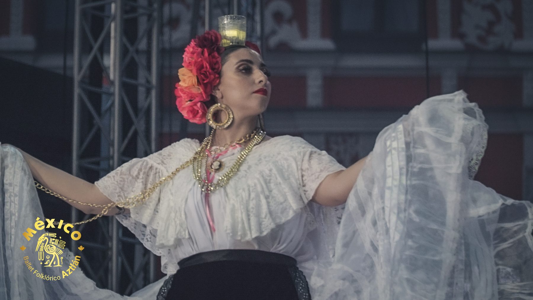 Veracruz dancer balancing a candle on her head